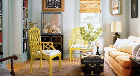 asian inspired living room with yellow chinese chippendale chairs