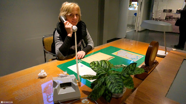 my mom making a call to Stalin at the DDR Museum in Berlin in Berlin, Germany 