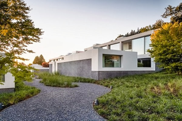 Courtyard Houses / Think Architecture fachada-conjunto-residencial