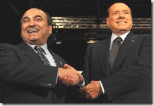 I due nani di Roma: Scilipoti e Berlusconi