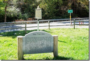 Site of the Hog Trial marker with state marker in background.