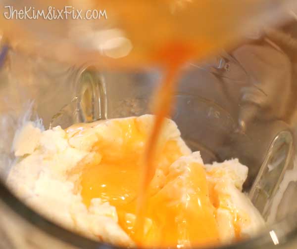 Adding orange syrup to ice cream
