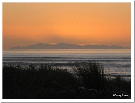 Sunset over the South Island as seen from Otaki Beach last evening.