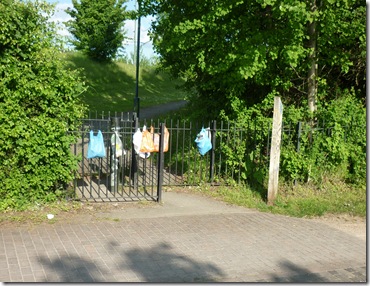 plastic bags in all the pointy railings