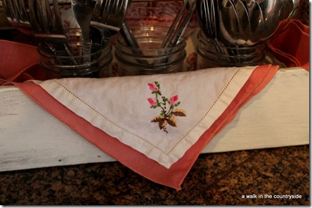 old tool tote used as cutlery holder and is easy to decorate for different holidays