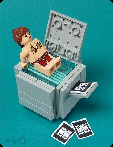 Naughty Lego Princess Leia In A Bikini sitting on a photocopier making butt prints