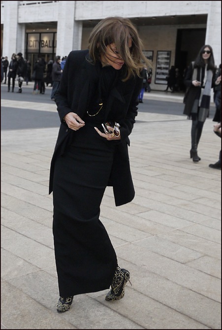 Carine Roitfeld showing black studded boots ol