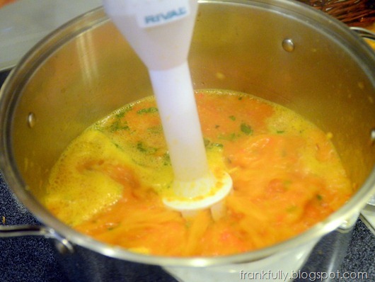 immersion blender in red pepper soup