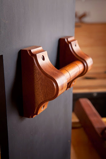 A handle on a Dutch tool chest that is designed to be mobile.