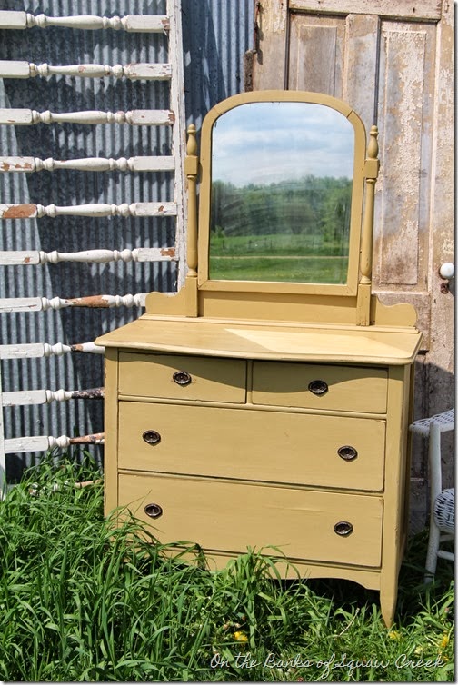 yellow antique dresser