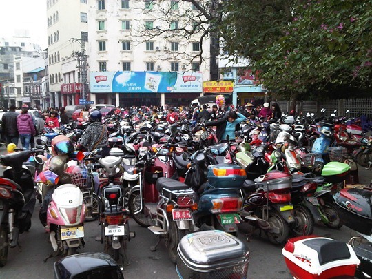 Scooters and bicycles in Haikou, China
