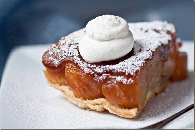 Tarte Tatin - French apple tart with caramelized apples and puff pastry based, all drizzled with caramel on top. 