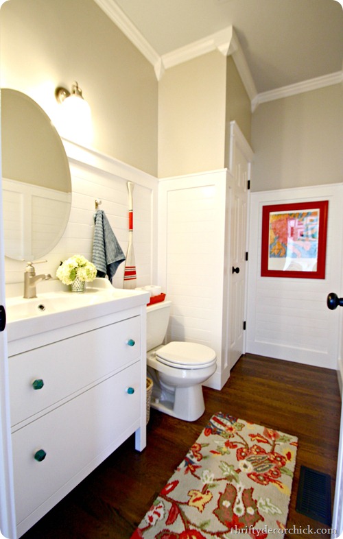white bathroom with red and blue