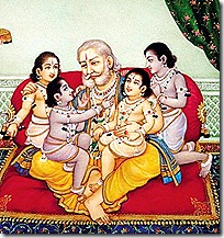 King Dasharatha with his four sons