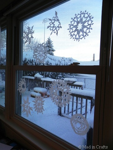 paper snowflakes on the window