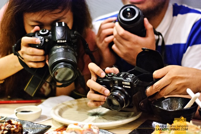 Shoot First, Eat Later. Dang Travel Bloggers!