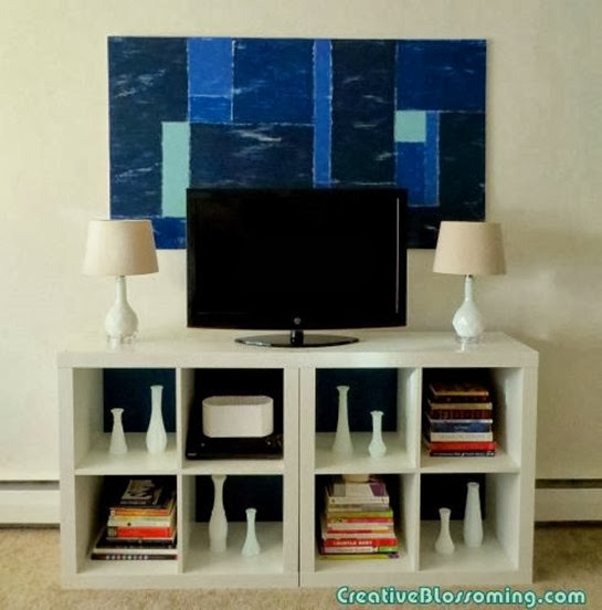 diy-distressed-color-block-wall-art-and-expedit-bookcases-with-blue-backing-001
