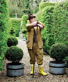 Nicky Haslam in the garden of his country house.