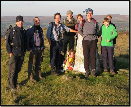 Walkers on the summit of Sir William Hill