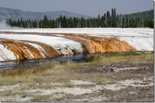 Sept 5, 2012: The colorful banks are from the thermophiles growing in the outflow from Rainbow Pool