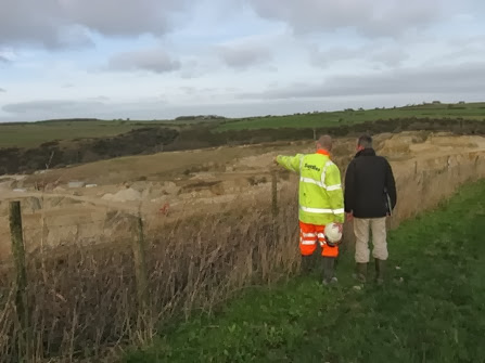Quarry manager Simon discusses the site with David