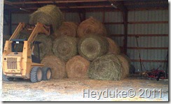 Stacking the round bales