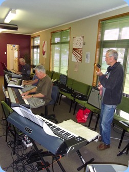 Jim Nicholson playing the Korg SP-250 digital piano with Brian Gunson adding guitar licks and Peter Brophy harmonizing in the background