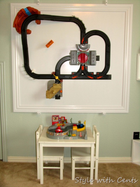 creating an inexpensive playroom4 hanging train tracks on walls playroom4
