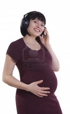 pregnant woman listening to music