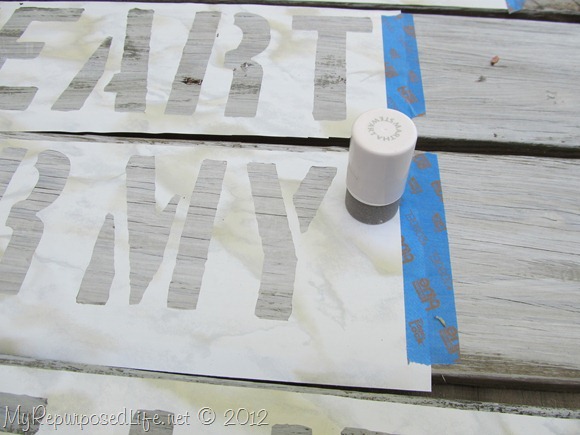 stenciling-a-sign-reclaimed-fence