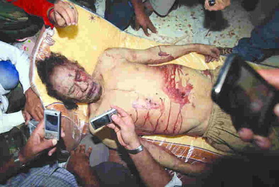 Kadhafi mort d'une blessure par balle, selon un médecin légiste - Algerie360