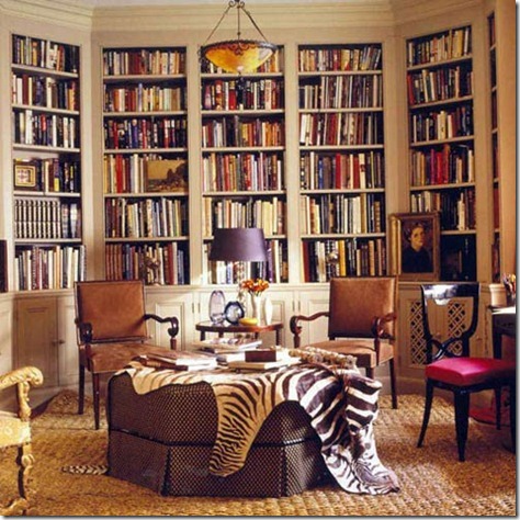 zebra-print-rug-thrown-over-an-ottoman-in-a-home-library-trendspotting-getting-wild-with-animal-prints-home-design-and-decor-ideas-and-inspiration