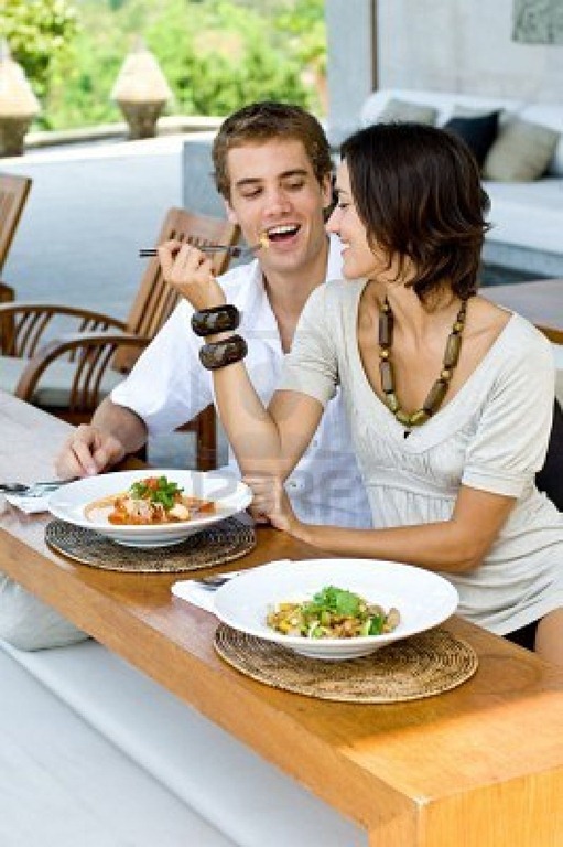 [2998393-a-young-couple-on-vacation-eating-lunch-at-a-relaxed-outdoor-restaurant-1%255B14%255D.jpg]