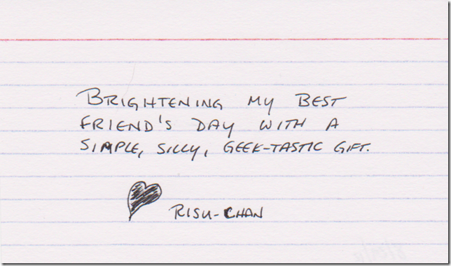 Brightening my best friend's day with a simple, silly, geek-tastic gift. (A heart, drawn & colored in black pen, and the name Risu-chan.)