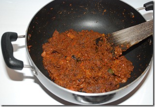 After the addition of  spice powders and tomato (step 3)