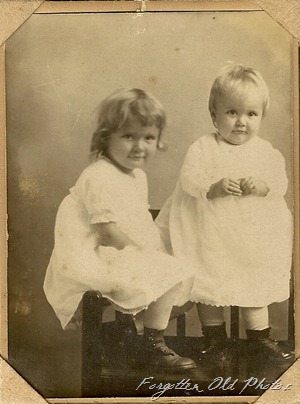 Two little gals in a chair RAS