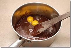Adding eggs and vanilla extract