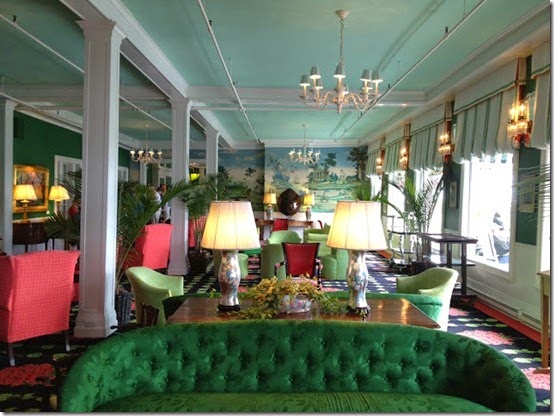 Grand Hotel green tufted sofa