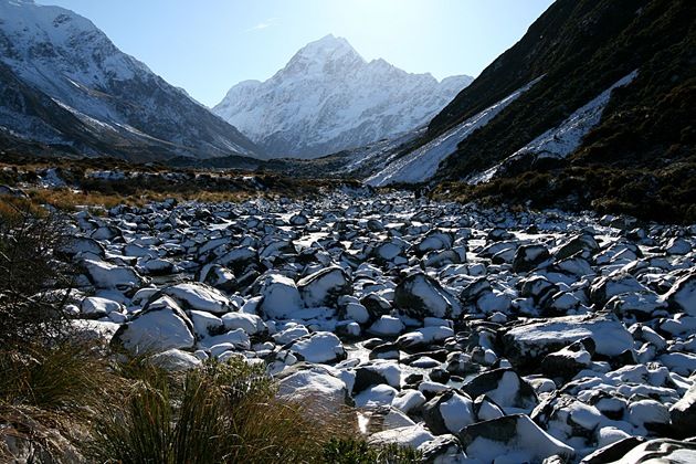 Snow covered rocks to Mount Cook