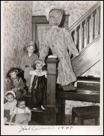 The stairs at Grandma Weber's house were a favorite playing place for cousins.  Here are five of those little ones posed by their parents on Halloween 1947.