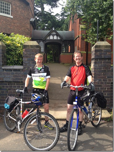 Fundraising bicycle ride - l-r - Ben Barker and Howard Barker outside St Mary's Church