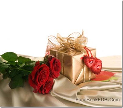 Gift Box And Red Roses 