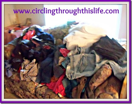 Heaps of Laundry needing to be folded www.circlingthroughthislife.com