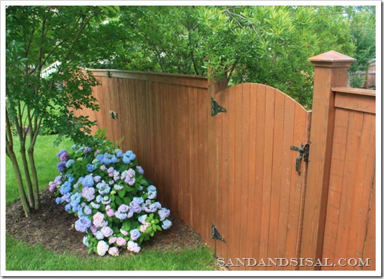 Copper Capped Fence with Hydrangeas