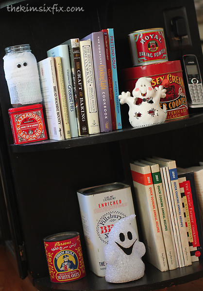 Ghosts on bookshelf