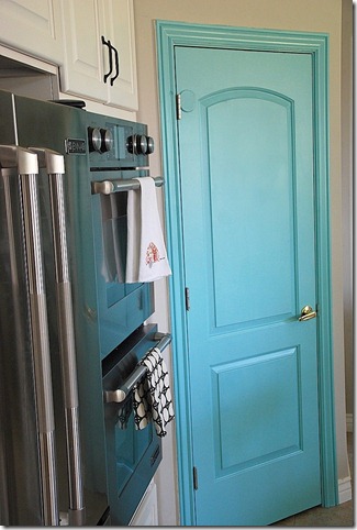turquoise pantry door from the side