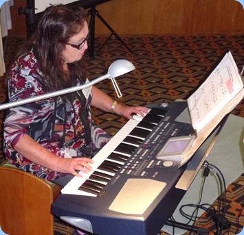 Desiree Barrows playing her Korg Pa500