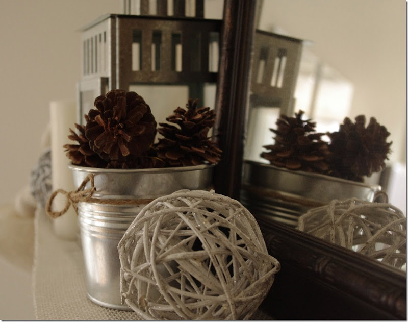 Christmas Mantel | IKEA decorative balls, SOCKER flowerpots, lantern, pinecones | personallyandrea.com