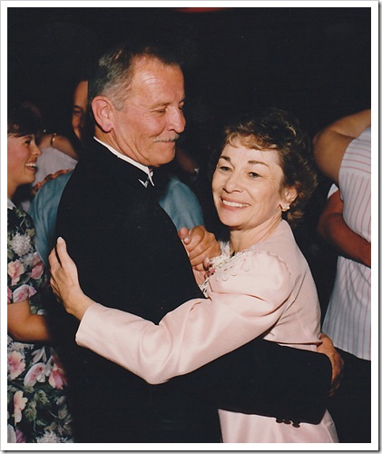 50th- dad & mom dancing