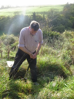 Dr David Jones digging an earthworm pit in Somerset